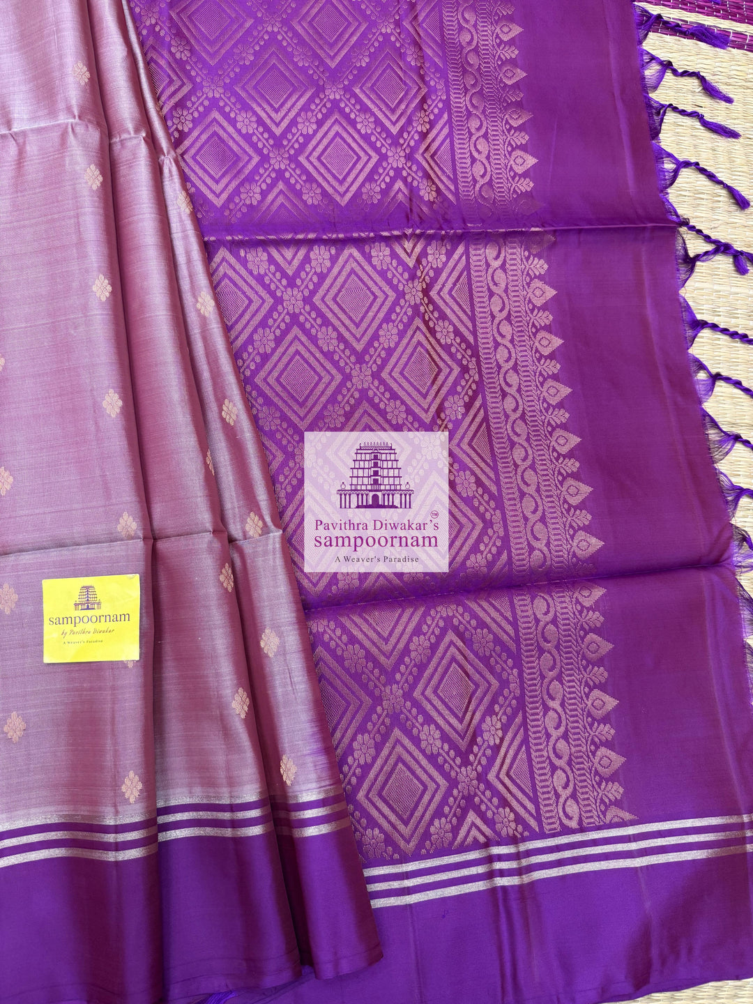 Mauve with Purple , rich Zari Butta in the body , Plain borders , rich Pallu Handloom Semi Soft Silk Saree