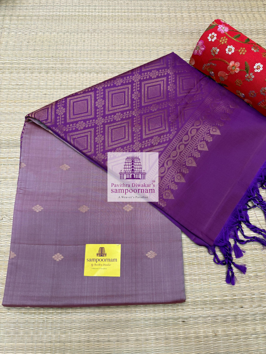 Mauve with Purple , rich Zari Butta in the body , Plain borders , rich Pallu Handloom Semi Soft Silk Saree