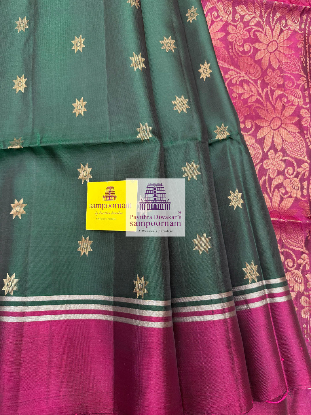 Dark Green with Magenta , rich Zari Butta in the body , Plain borders , rich Pallu Handloom Semi Soft Silk Saree