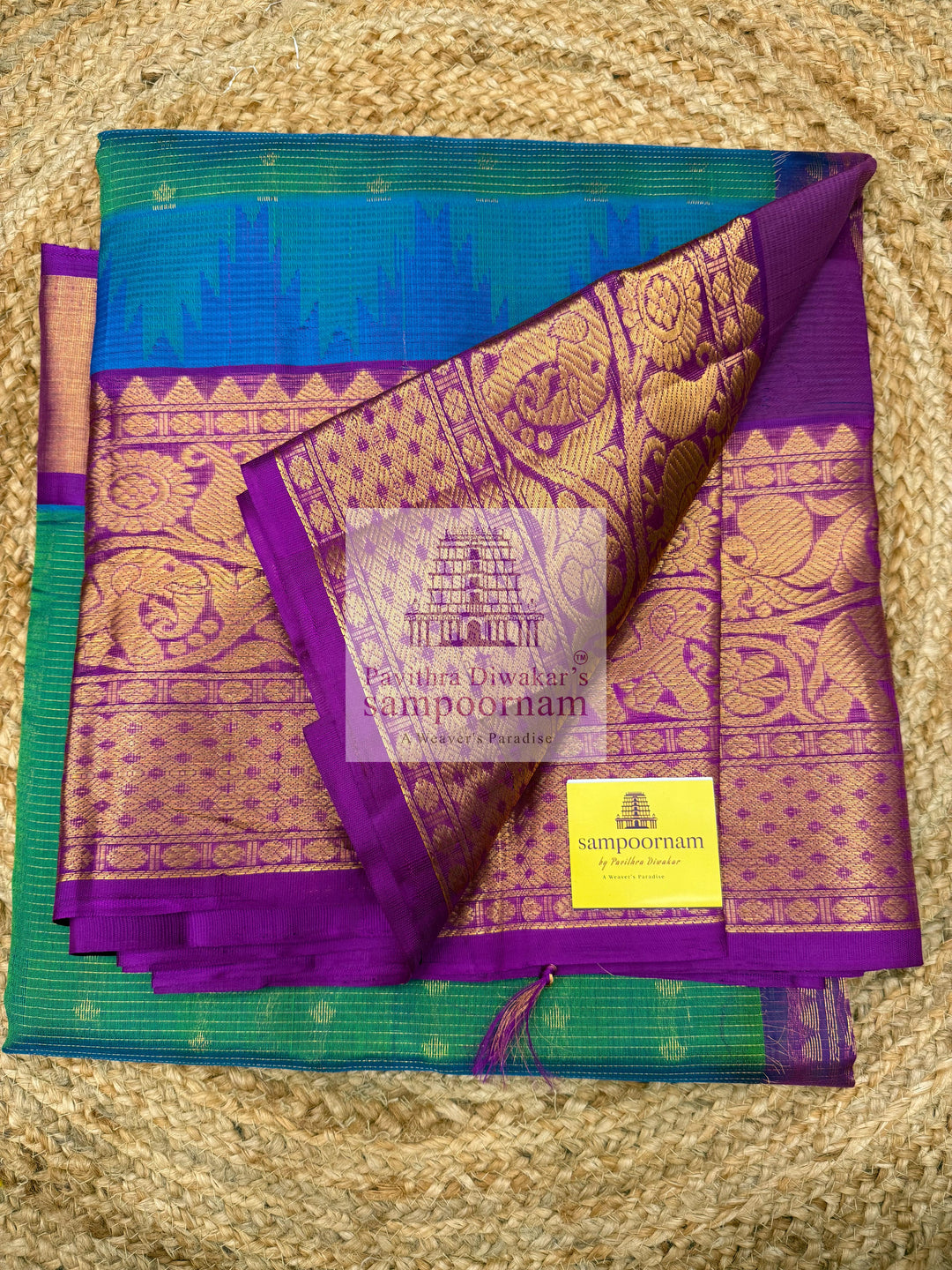 Turquoise Blue with Purple , Zari Podi Kattam in the body , traditional borders and rich Pallu Korvai Silk Cotton Saree