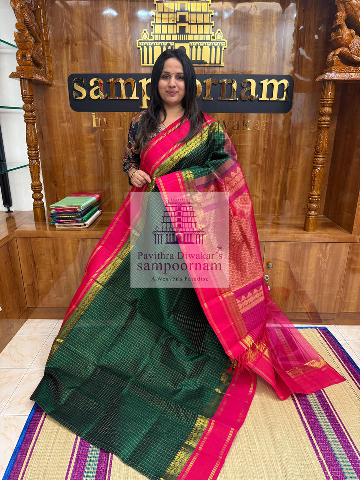 Dark Green with Red , Zari checks in the body , rich borders with traditonal Pallu Korvai Silk Cotton Saree
