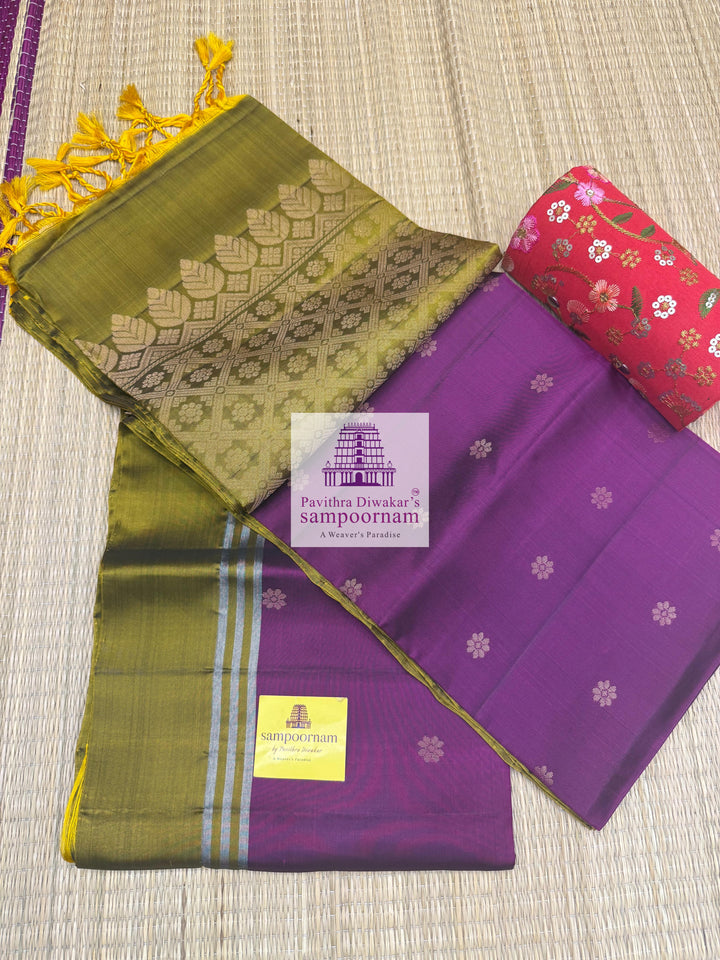 Purple with Mehandi Green , rich Zari Butta in the body , Plain borders , rich Pallu Handloom Semi Soft Silk Saree