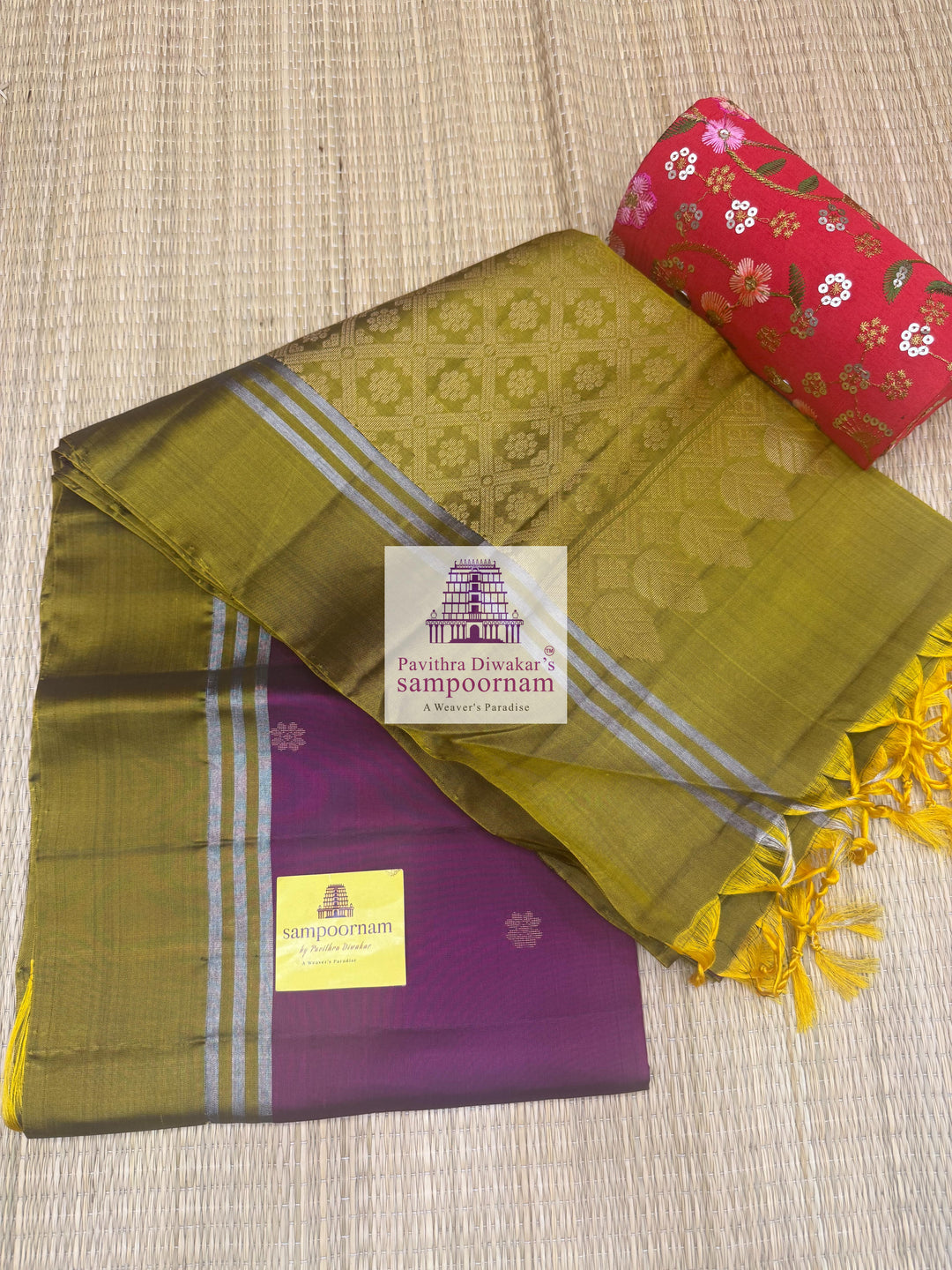 Purple with Mehandi Green , rich Zari Butta in the body , Plain borders , rich Pallu Handloom Semi Soft Silk Saree