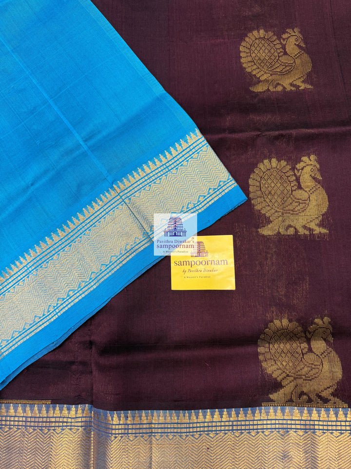Dark Brown with Turquoise Blue , Annam Zari Butta in the body and traditional border , Rich Pallu Silk Cotton Saree