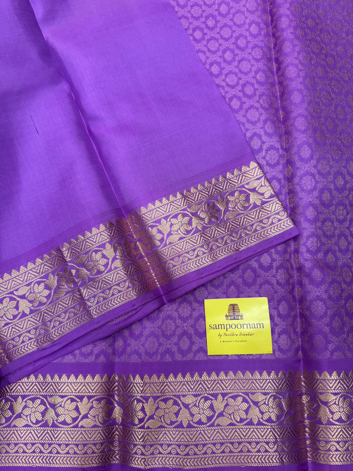 Lilac colour with Floral Banarasi rich Zari butta and Grand Gold Zari border , Pure Soft Silk Saree