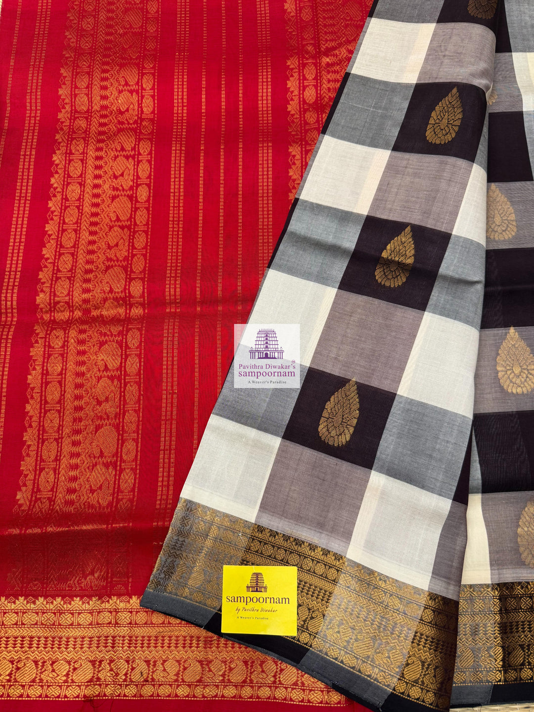 White , Brown  and Grey with Red , Mango butta in the body , traditional borders and rich Pallu Silk Cotton Saree