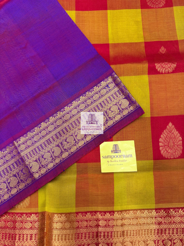 Red , Orange and Mustard with Purple , Mango butta in the body , traditional borders and rich Pallu Silk Cotton Saree