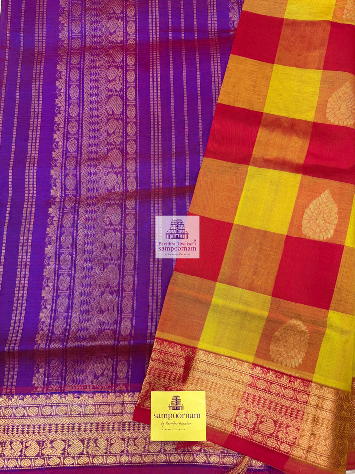 Red , Orange and Mustard with Purple , Mango butta in the body , traditional borders and rich Pallu Silk Cotton Saree