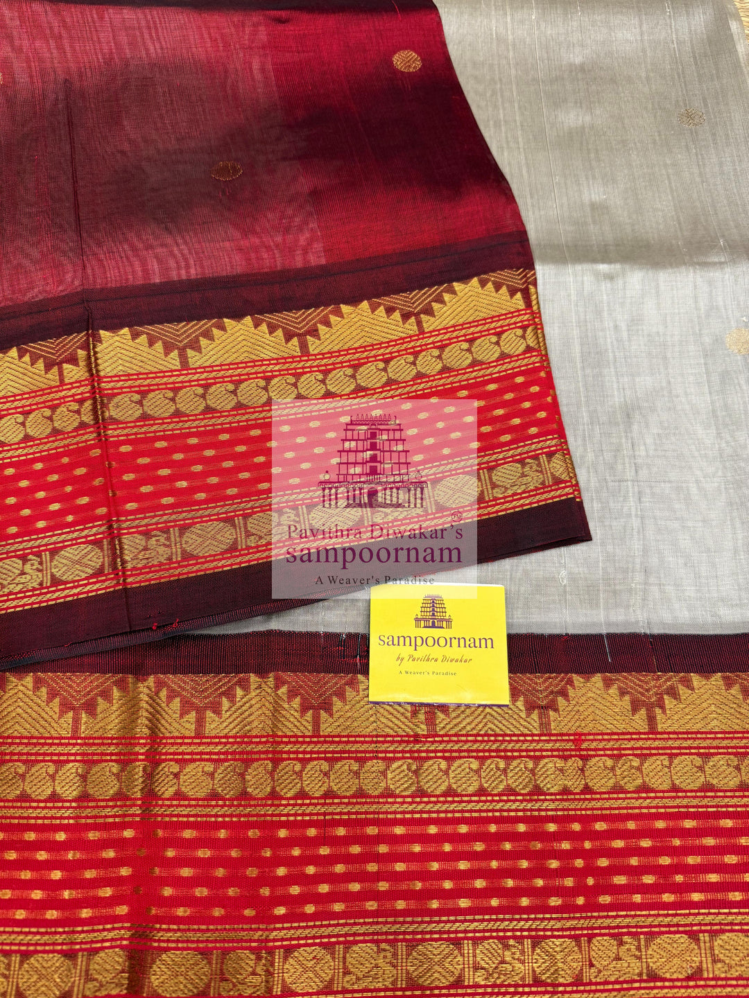 Light Grey with Red , Lakshadeepam borders and rich Pallu Zari butta in the body Korvai Silk Cotton Saree
