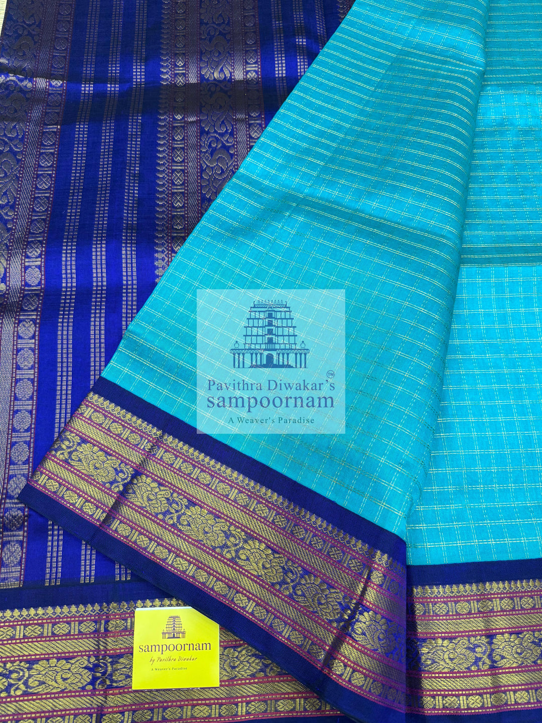 Ramar Blue with Blue  , Zari checks in the body , traditional borders with rich Pallu Korvai Silk Cotton Saree
