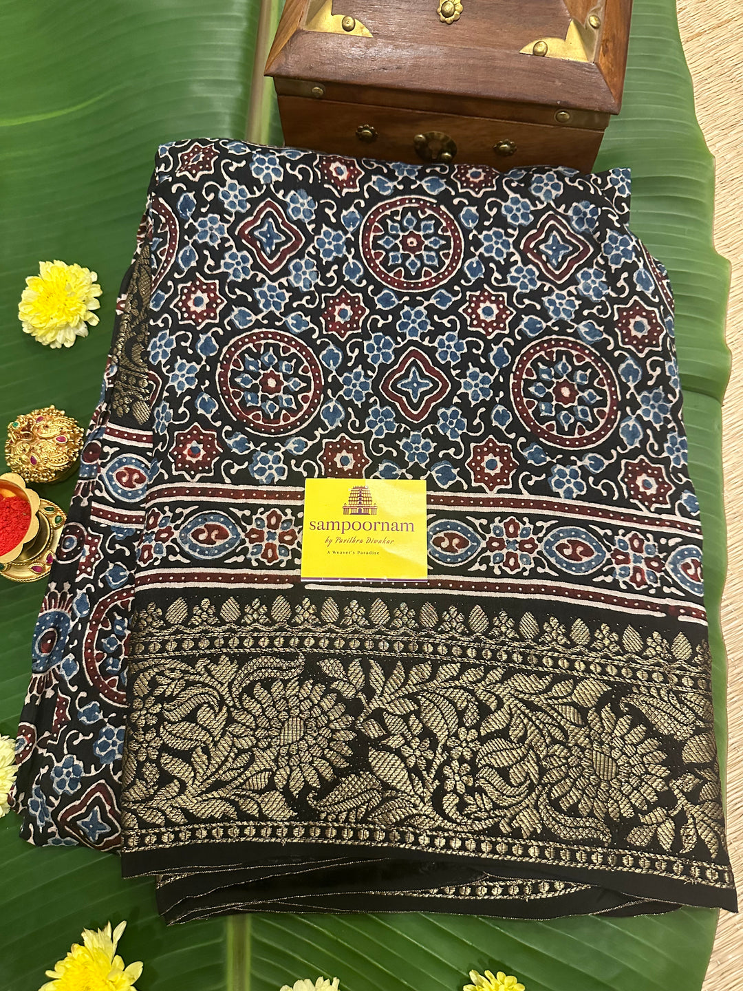 Indigo blue Ajrakh Natural Handblock Printed with Rich Minakrai Border and Pallu Pure Dola Silk Saree