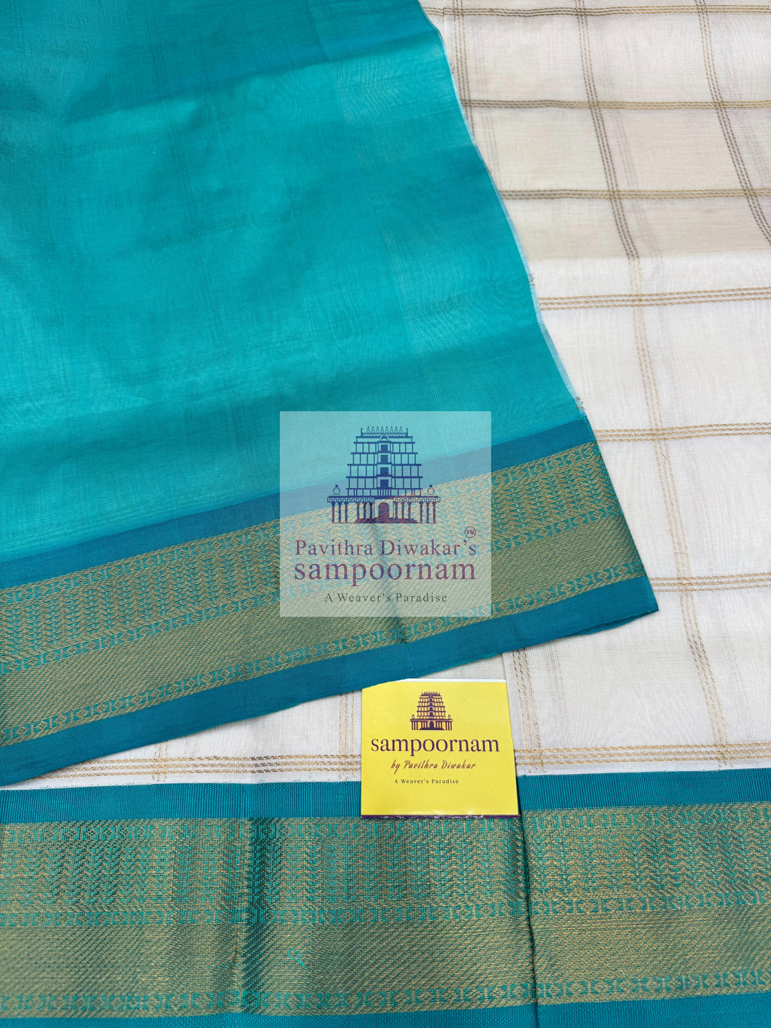 Half White with Turquoise Blue  , Zari checks in the body , traditional borders with richPallu Korvai Silk Cotton Saree