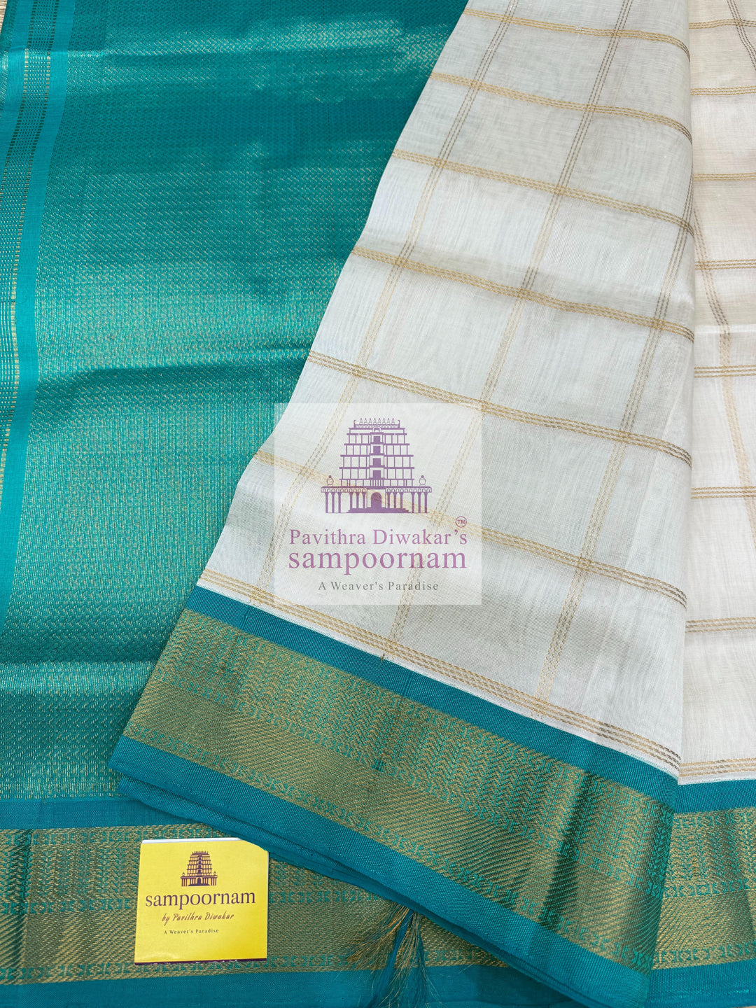 Half White with Turquoise Blue  , Zari checks in the body , traditional borders with richPallu Korvai Silk Cotton Saree