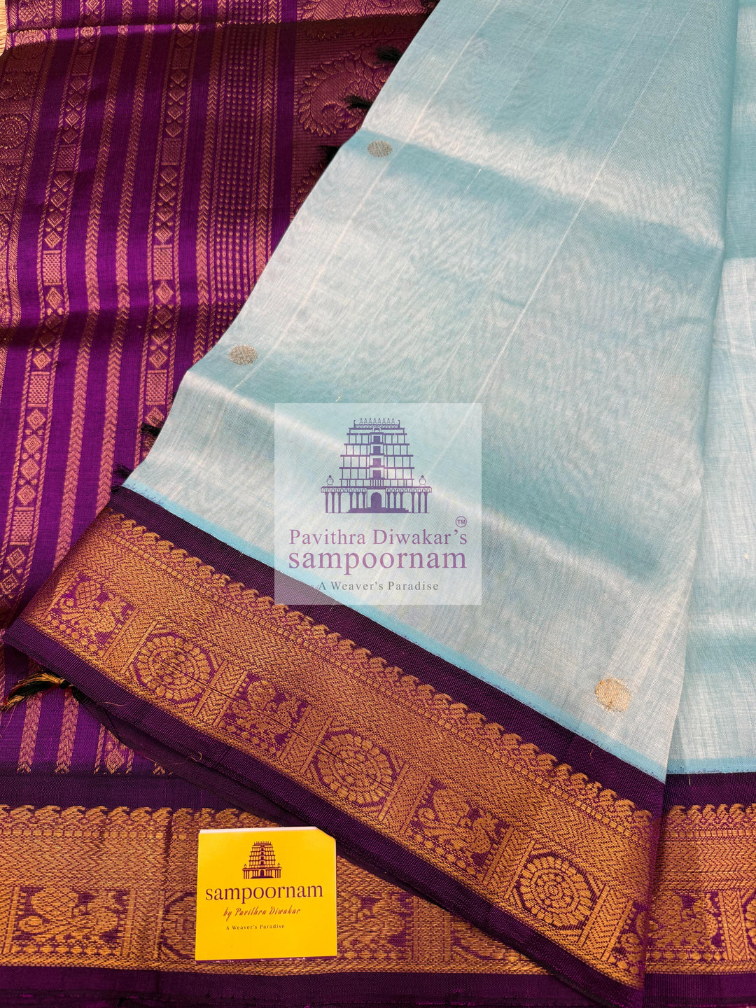 Teel Blue with Purple  , Zari butta in the body , traditional borders with rich Pallu Korvai Silk Cotton Saree