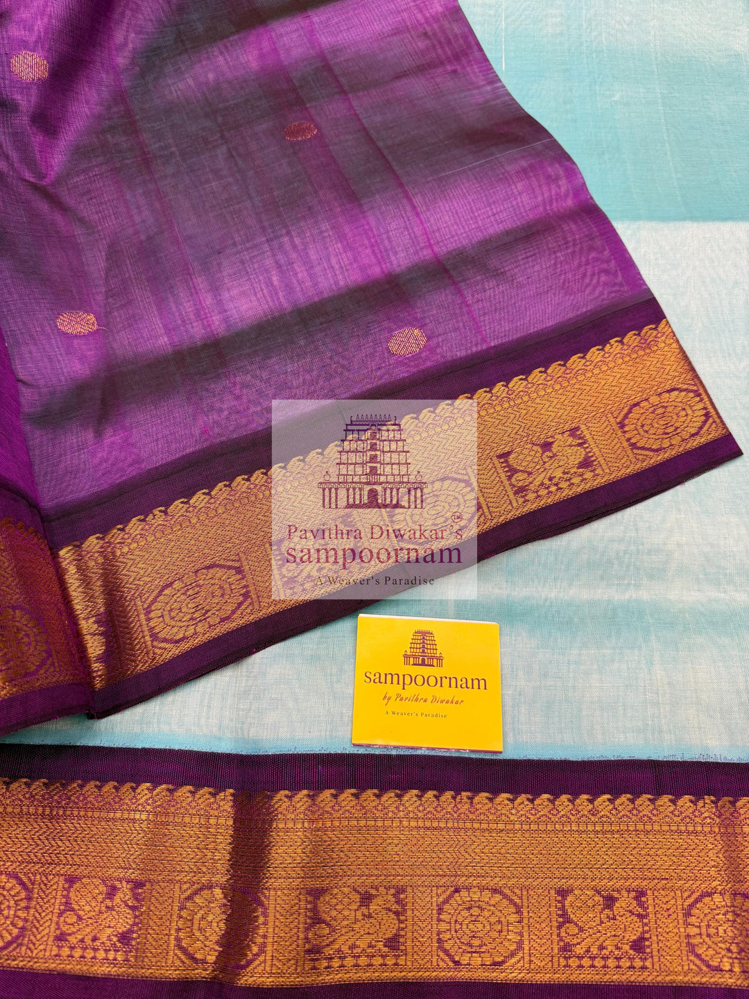 Teel Blue with Purple  , Zari butta in the body , traditional borders with rich Pallu Korvai Silk Cotton Saree