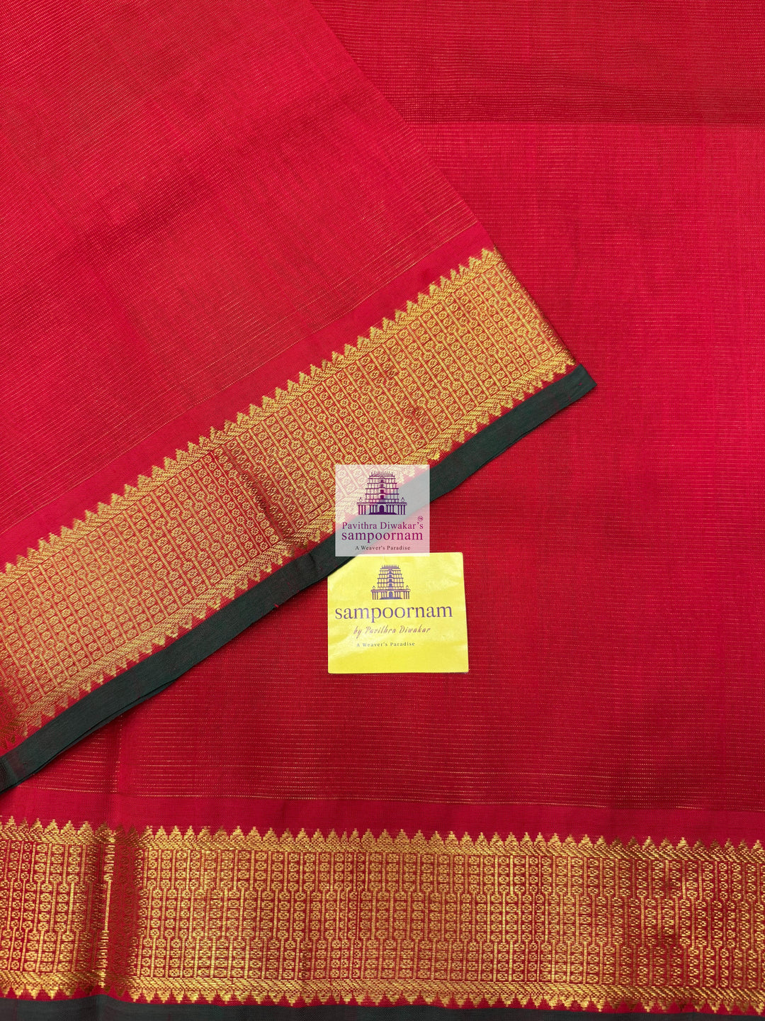Passion Red , Green Selvedge , Vairaoosi Zari lines in the body , traditional borders and rich Pallu Silk Cotton Sarees