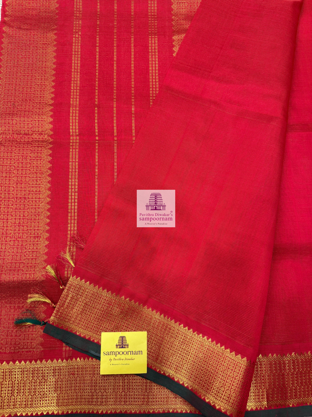 Passion Red , Green Selvedge , Vairaoosi Zari lines in the body , traditional borders and rich Pallu Silk Cotton Sarees