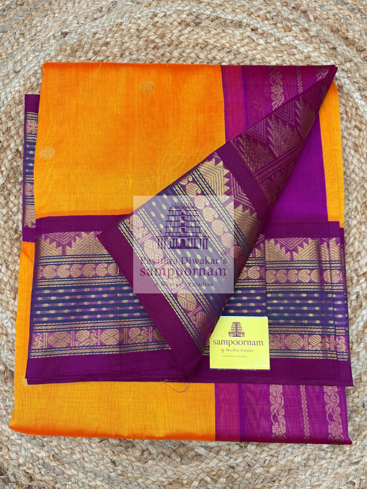 Mambazha Yellow with Rani Pink , Lakshadeepam borders and rich Pallu Zari butta in the body Korvai Silk Cotton Saree