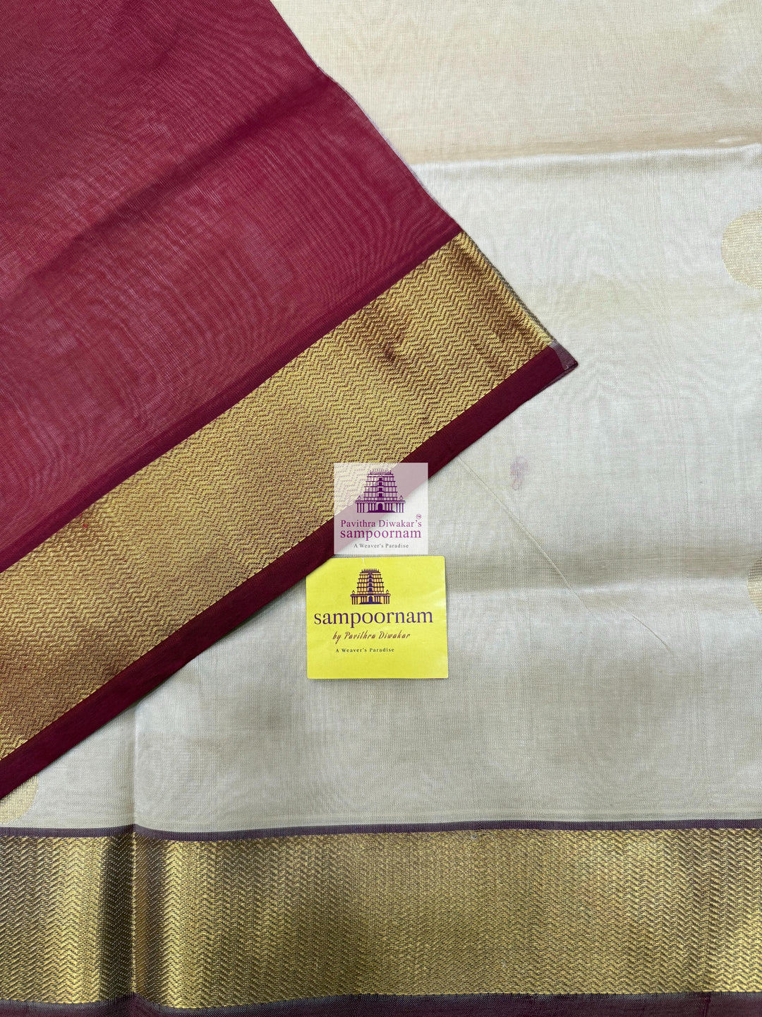 Light Gold with Red , rich Zari butta in the body , traditional border and traditional border and Rich Pallu Silk Cotton Saree