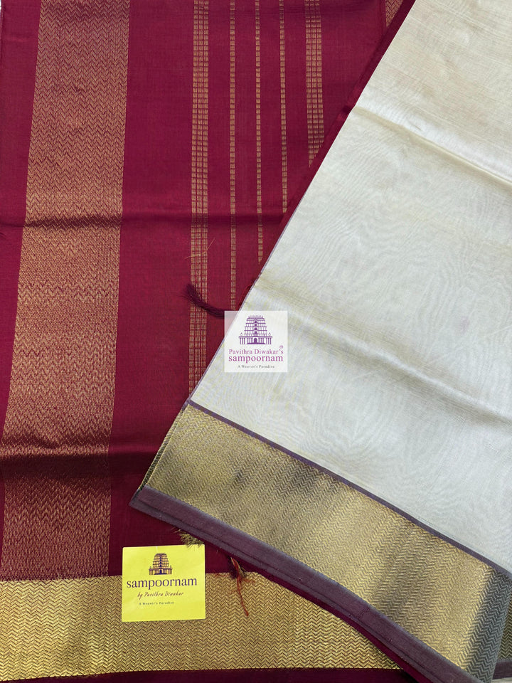 Light Gold with Red , rich Zari butta in the body , traditional border and traditional border and Rich Pallu Silk Cotton Saree