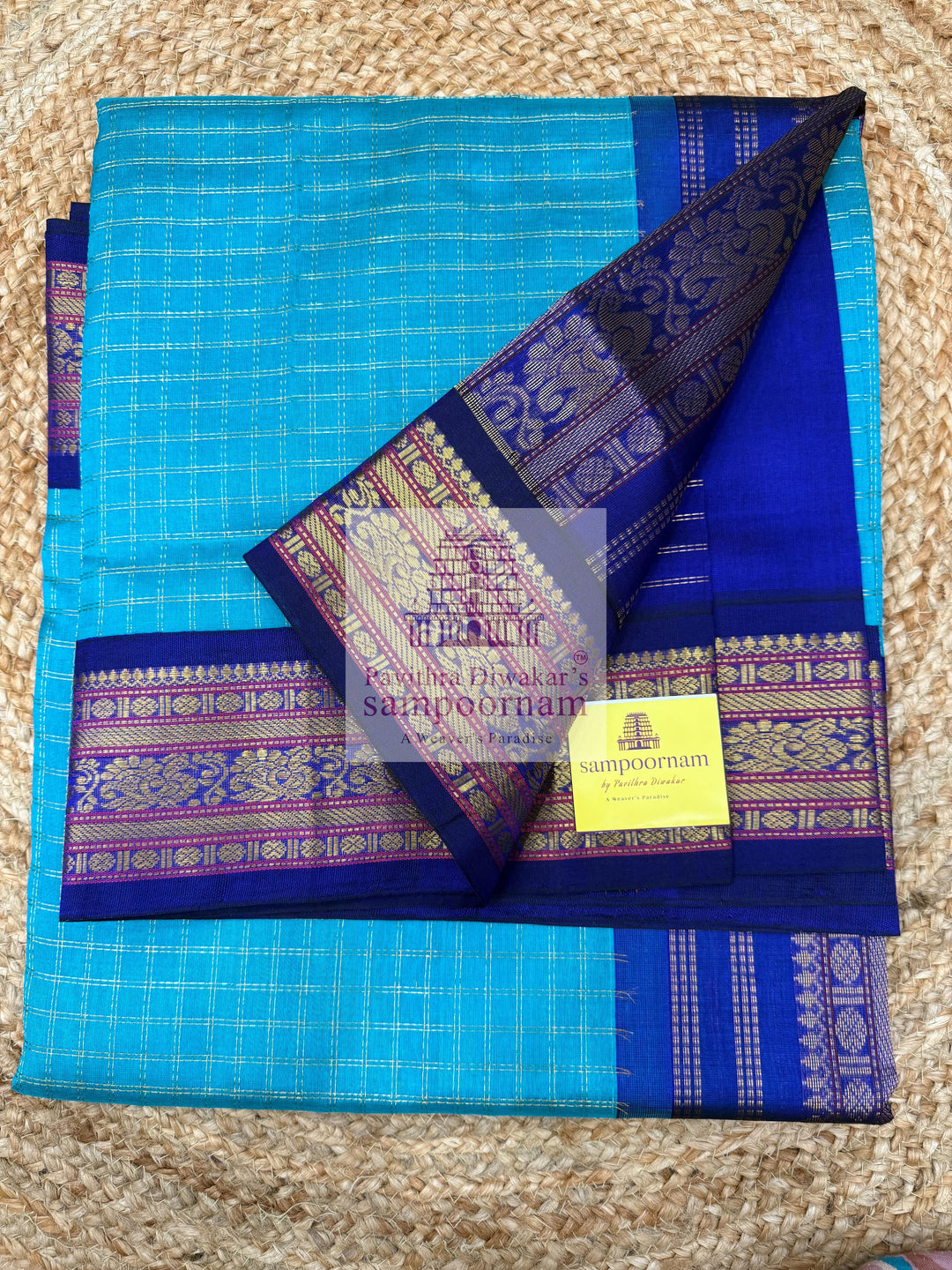 Ramar Blue with Blue  , Zari checks in the body , traditional borders with rich Pallu Korvai Silk Cotton Saree