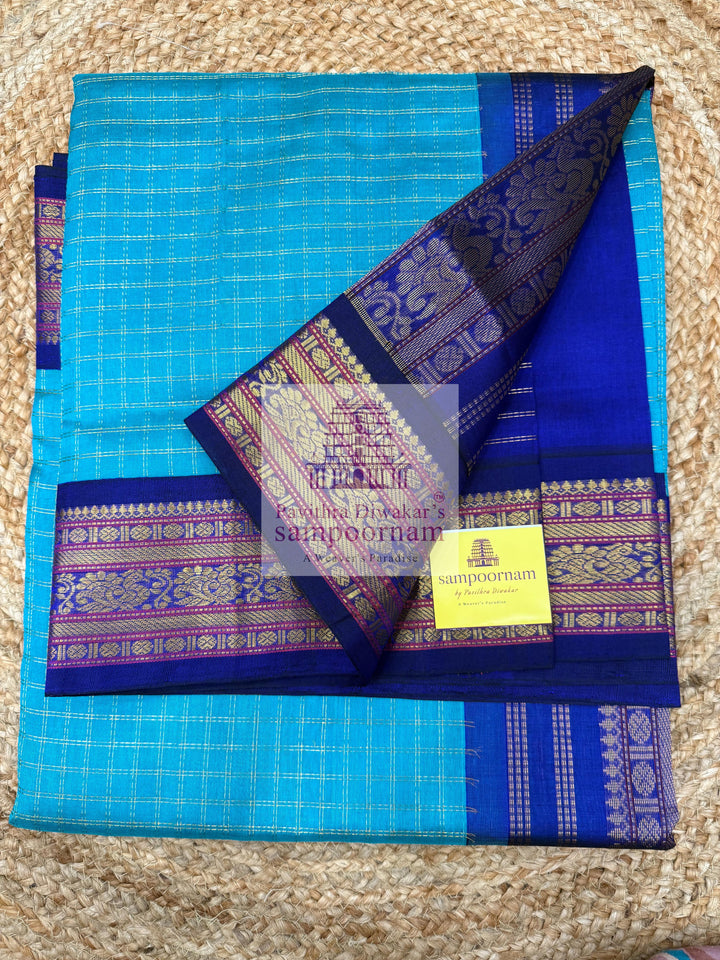 Ramar Blue with Blue  , Zari checks in the body , traditional borders with rich Pallu Korvai Silk Cotton Saree