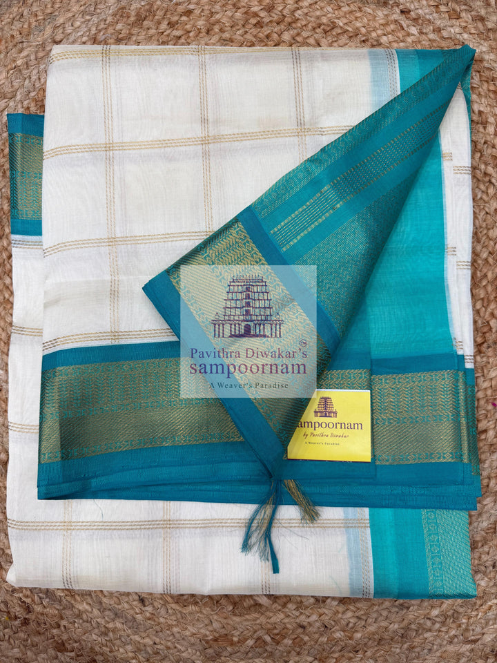 Half White with Turquoise Blue  , Zari checks in the body , traditional borders with richPallu Korvai Silk Cotton Saree
