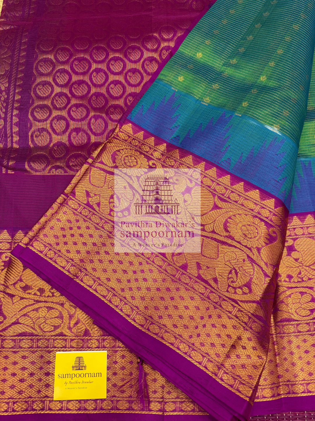 Turquoise Blue with Purple , Zari Podi Kattam in the body , traditional borders and rich Pallu Korvai Silk Cotton Saree