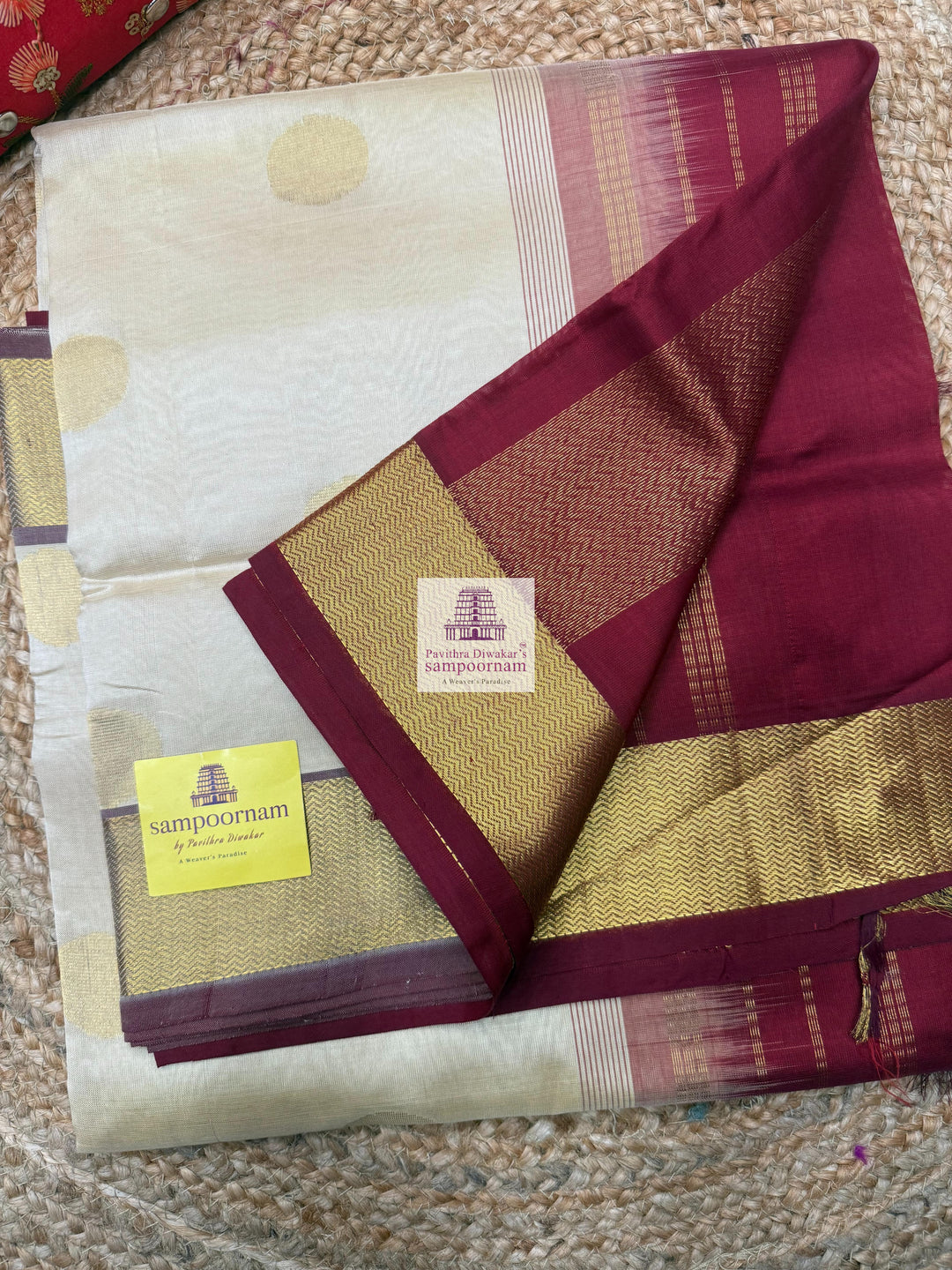 Light Gold with Red , rich Zari butta in the body , traditional border and traditional border and Rich Pallu Silk Cotton Saree