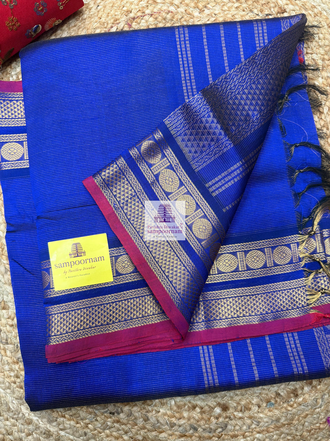Moraccan Blue , Red Selvedge , Vairaoosi Zari lines in the body , traditional borders and rich Pallu Silk Cotton Sarees