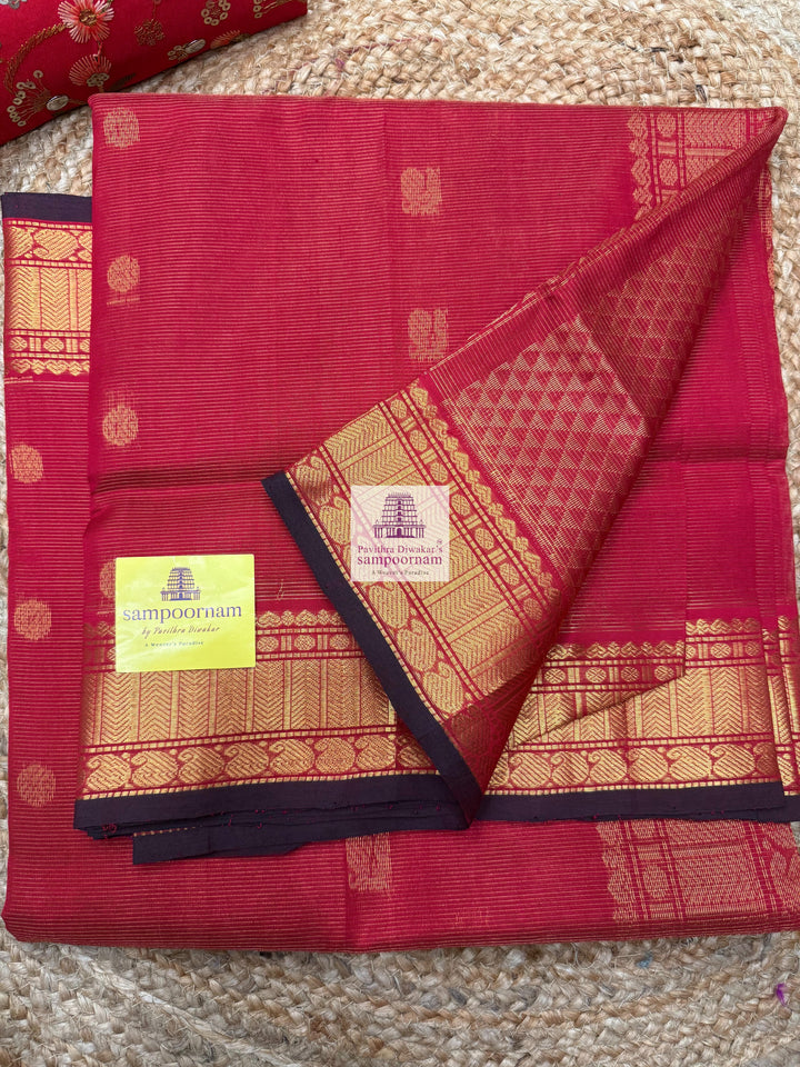 Classic Red , Maroon Selvedge , Annam  Zari Butta and  Vairaoosi Zari lines in the body , traditional borders and rich Pallu Silk Cotton Sarees