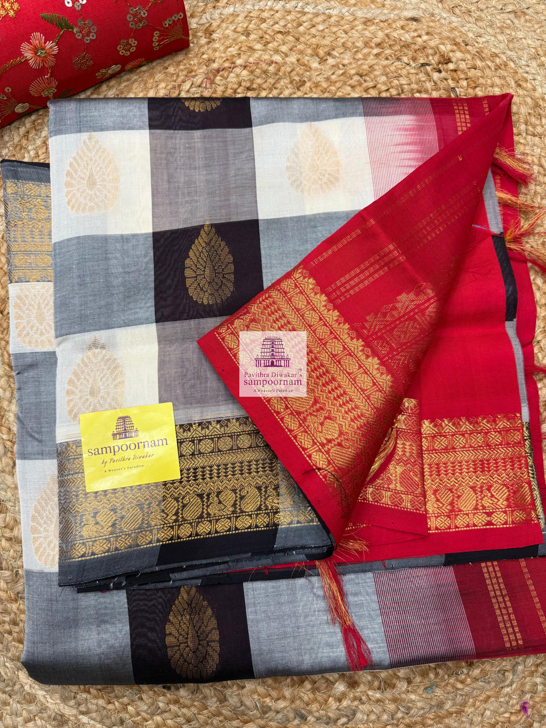 White , Brown  and Grey with Red , Mango butta in the body , traditional borders and rich Pallu Silk Cotton Saree