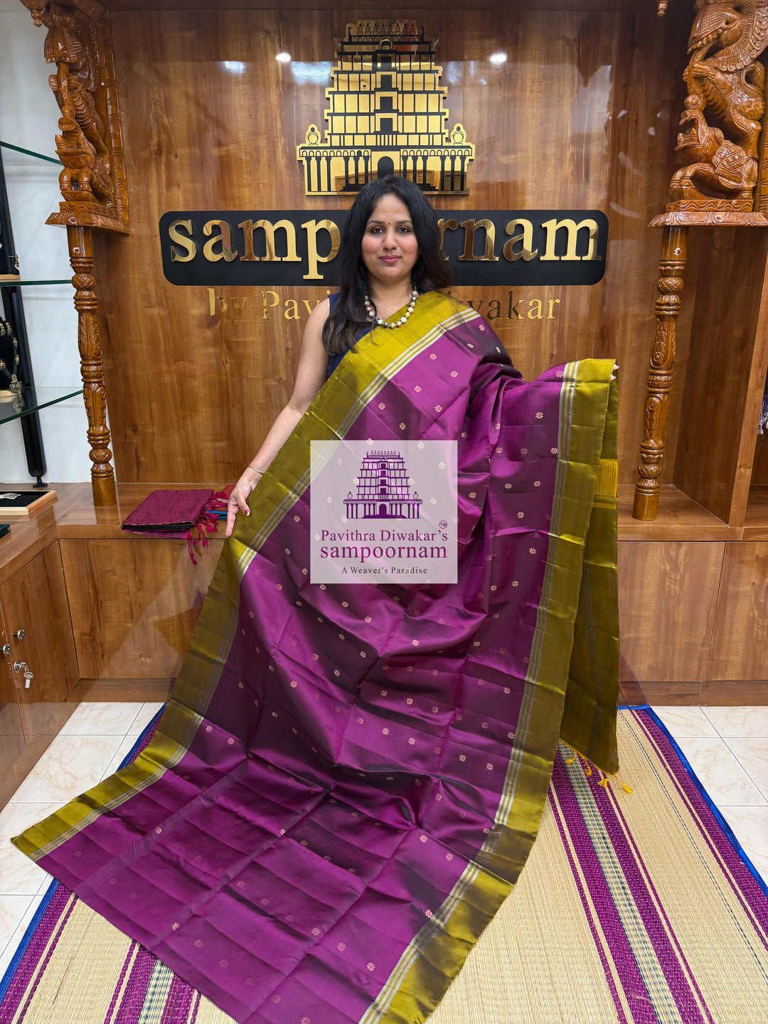 Purple with Mehandi Green , rich Zari Butta in the body , Plain borders , rich Pallu Handloom Semi Soft Silk Saree