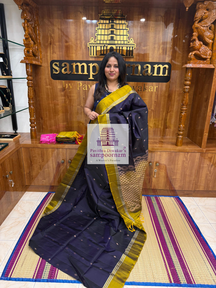 Jamun with Fenugreek Green , rich Zari Butta in the body , Plain borders , rich Pallu Handloom Semi Soft Silk Saree