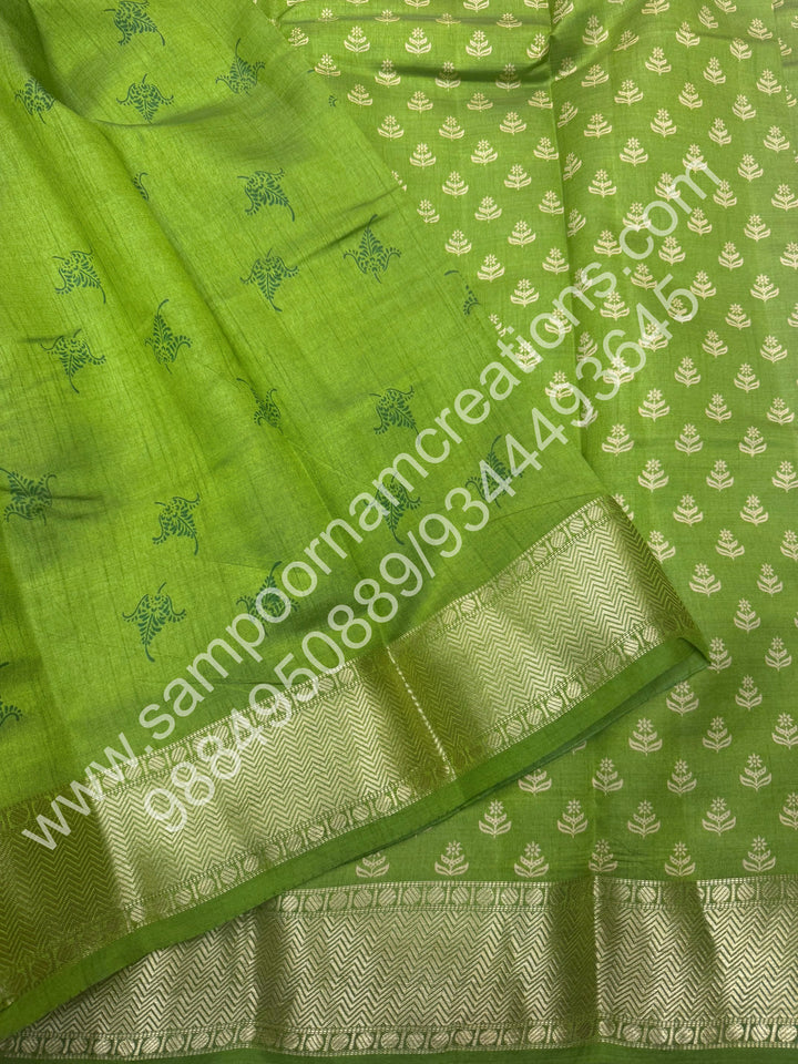 Light Green , Floral Prints in the body .Tissue Pallu and Printed Blouse Semi Tussar Saree