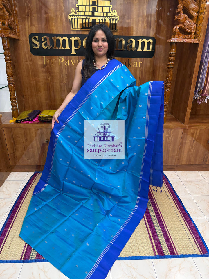 Ramar Blue with Dark Blue , rich Zari Butta in the body , Plain borders , rich Pallu Handloom Semi Soft Silk Saree