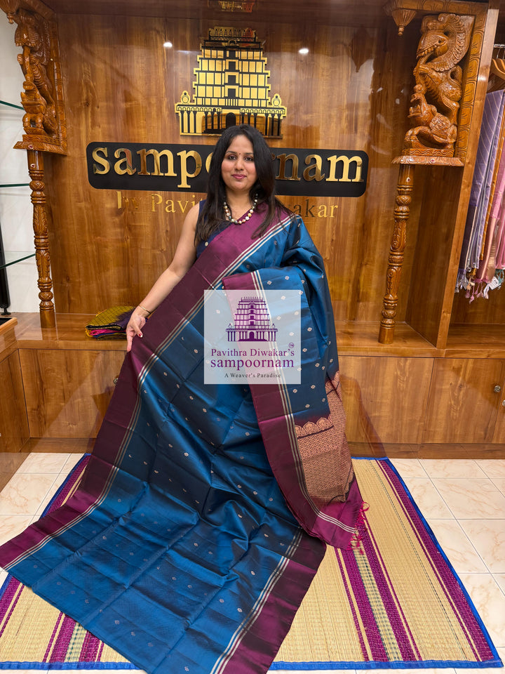 Classic Blue with Magenta , rich Zari Butta in the body , Plain borders , rich Pallu Handloom Semi Soft Silk Saree