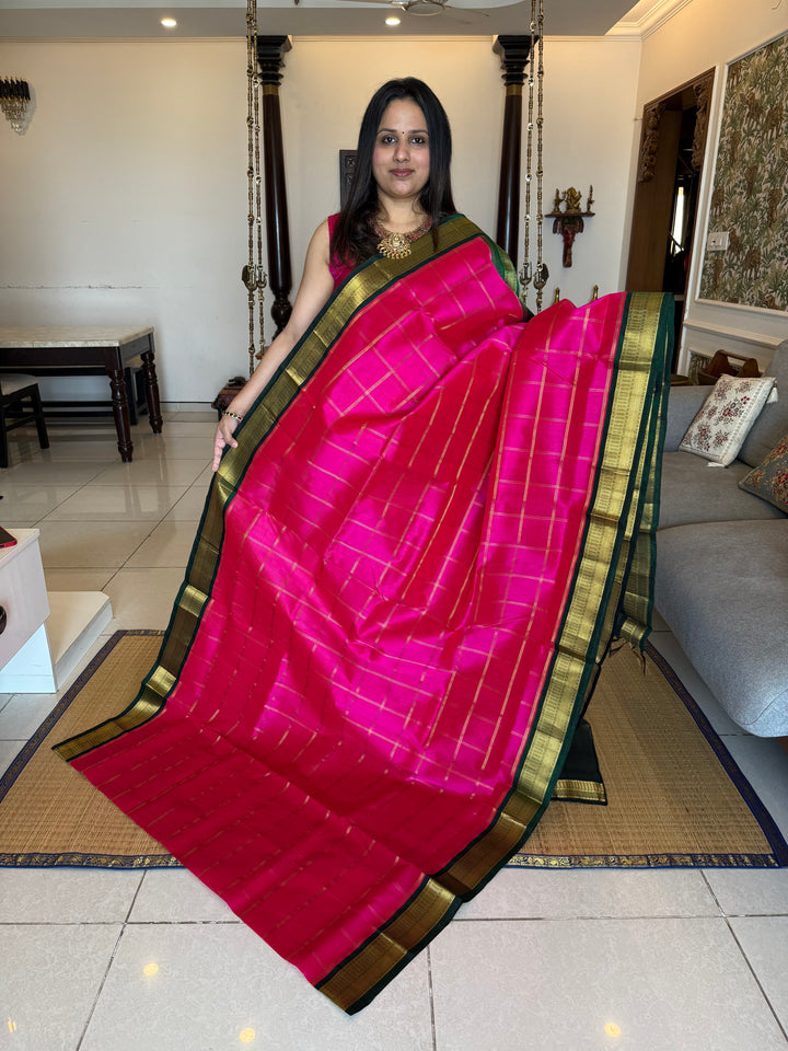 Dark Pink with Green , Rich Zari Big Checks in the Body , Traditional Borders and Rich Pallu Korvai Silk Cotton Saree