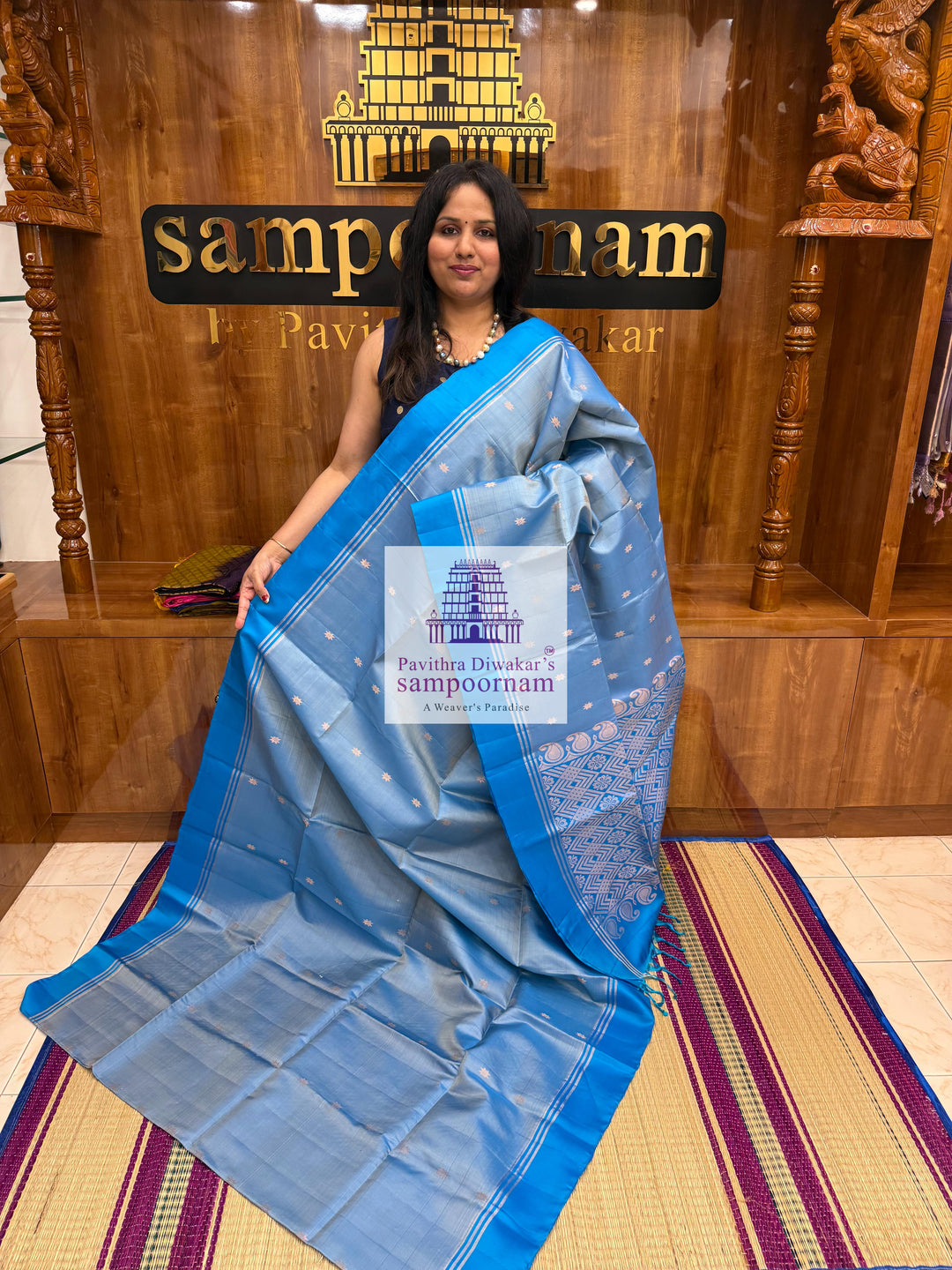 Light Blue with Blue , rich Zari Butta in the body , Plain borders , rich Pallu Handloom Semi Soft Silk Saree
