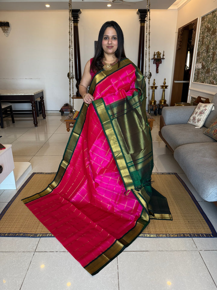 Dark Pink with Green , Rich Zari Big Checks in the Body , Traditional Borders and Rich Pallu Korvai Silk Cotton Saree