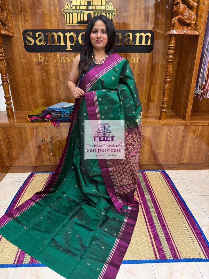 Forest Green with Magenta , rich Zari Butta in the body , Plain borders , rich Pallu Handloom Semi Soft Silk Saree