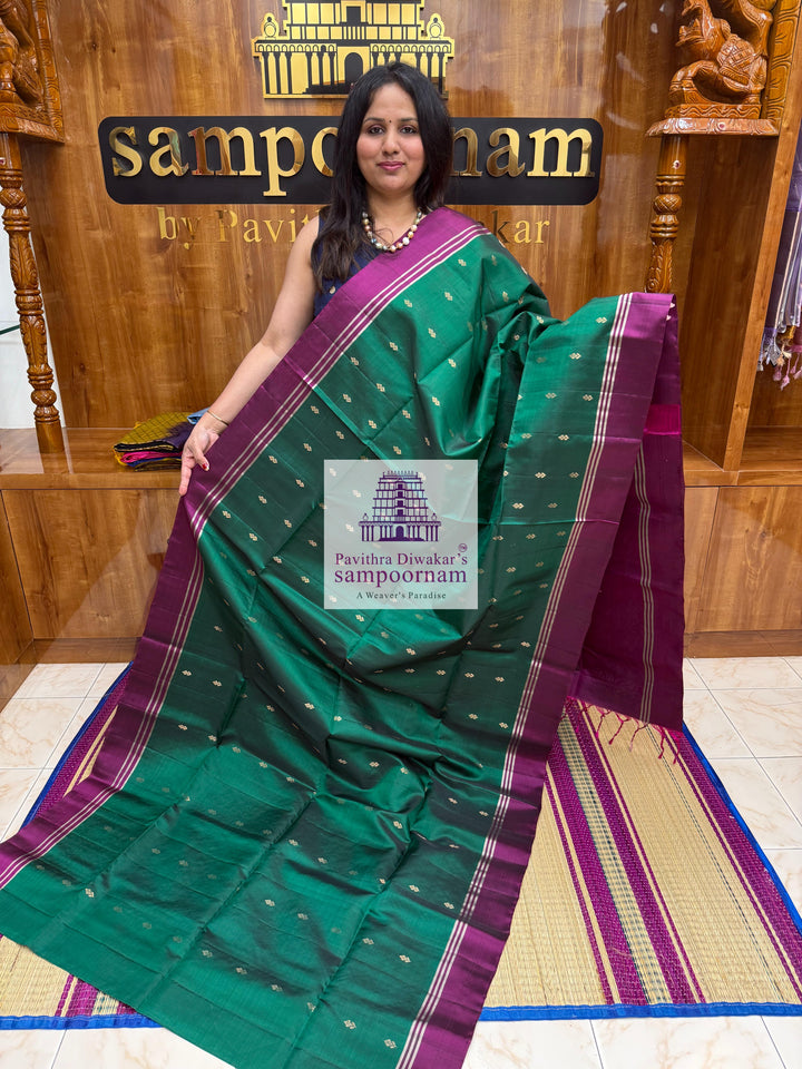 Forest Green with Magenta , rich Zari Butta in the body , Plain borders , rich Pallu Handloom Semi Soft Silk Saree