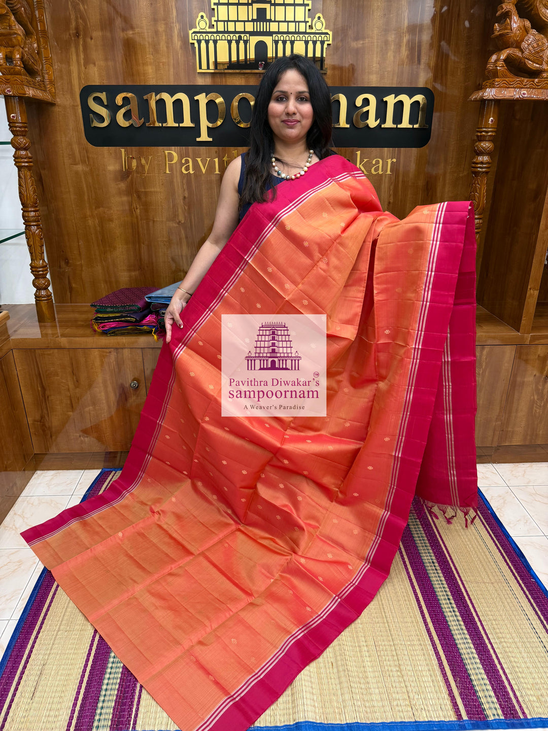 Rustic Orange with Reddish Pink , rich Zari Butta in the body , Plain borders , rich Pallu Handloom Semi Soft Silk Saree