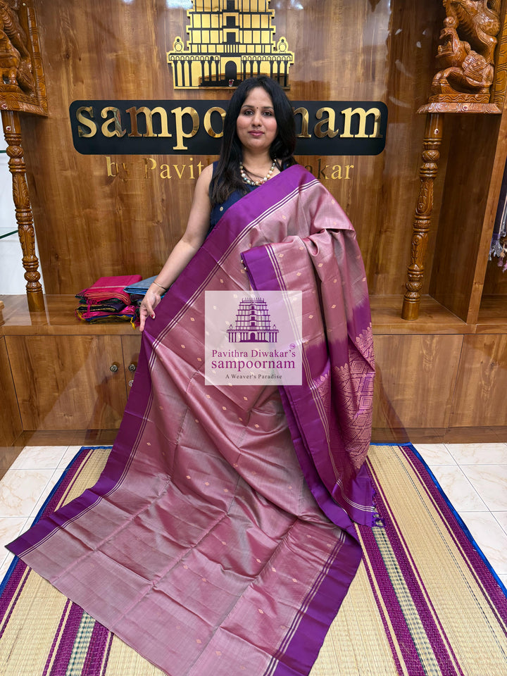 Mauve with Purple , rich Zari Butta in the body , Plain borders , rich Pallu Handloom Semi Soft Silk Saree