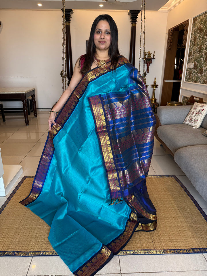 Dark Blue with Light Blue , Podi Kattam in the Body , traditional Borders and rich Pallu Korvai Silk Cotton Saree