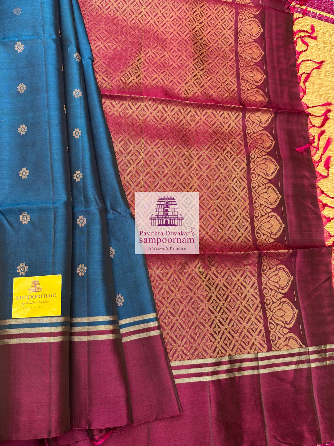 Classic Blue with Magenta , rich Zari Butta in the body , Plain borders , rich Pallu Handloom Semi Soft Silk Saree