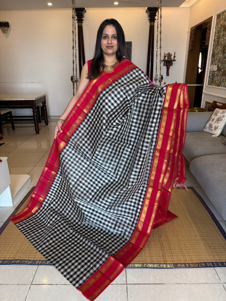 Black and White colour  checks with Pink , rettapet border and traditional rich Pallu Korvai Silk Cotton Saree
