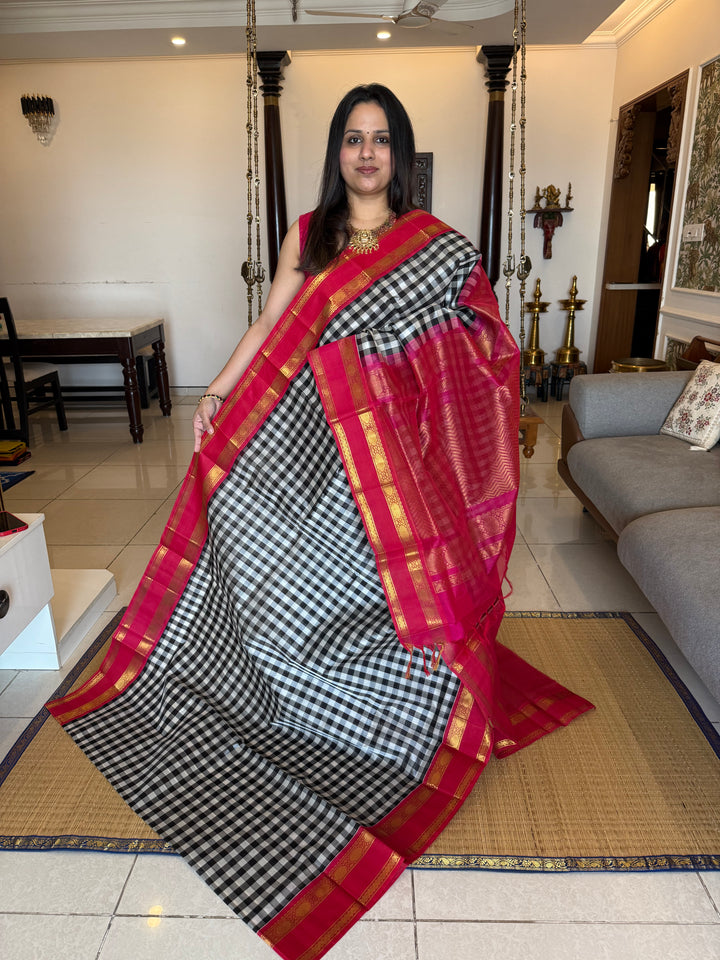 Black and White colour  checks with Pink , rettapet border and traditional rich Pallu Korvai Silk Cotton Saree