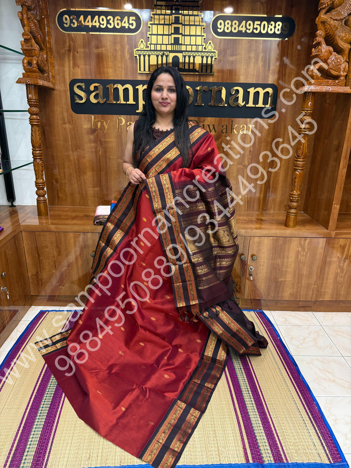 Brick Orange with Dark Arakku  , Rich Floral  Zari butta with Rettapet Border and Rich Pallu Pure Korvai Silk Cotton Saree