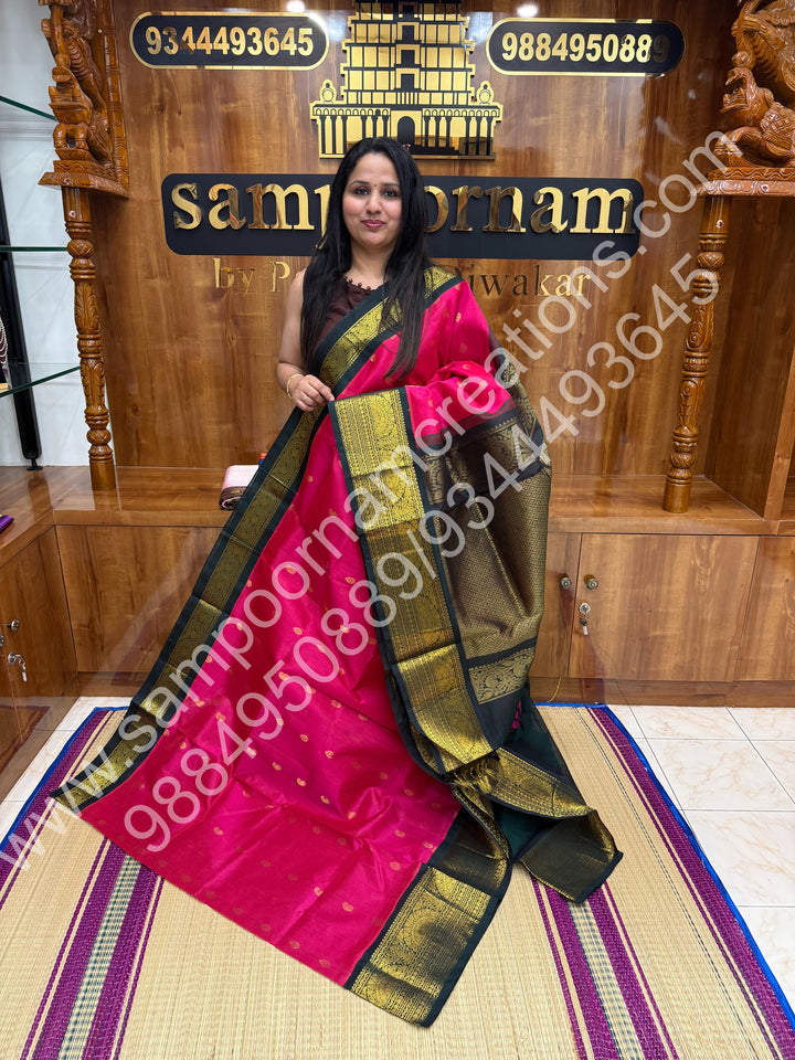Rani Pink with Bottle Green  , Rich  Zari butta with Traditional Big  Border and Rich Pallu Pure Korvai Silk Cotton Saree